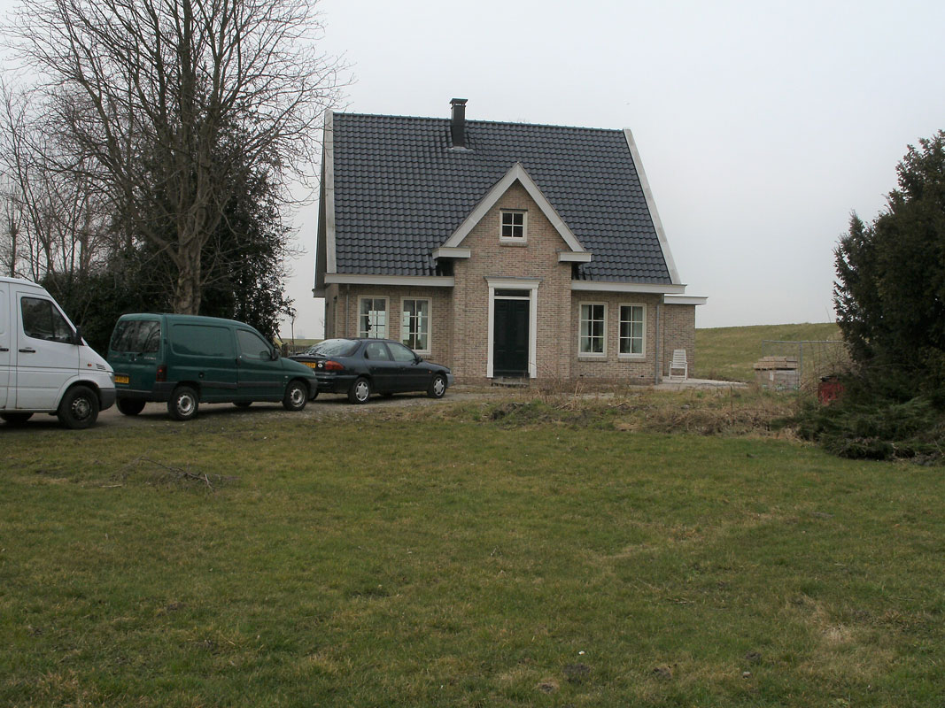 Buitenwens-Tuinontwerp-Heemskerk-LandelijkeTuin-Assendelft-notariswoning-in-polder-Voor